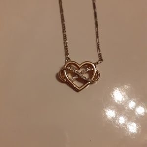 Gold and diamond necklace.